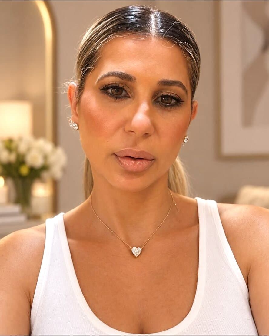 Portrait of Rosie, spray tan specialist, in her Midwood studio
